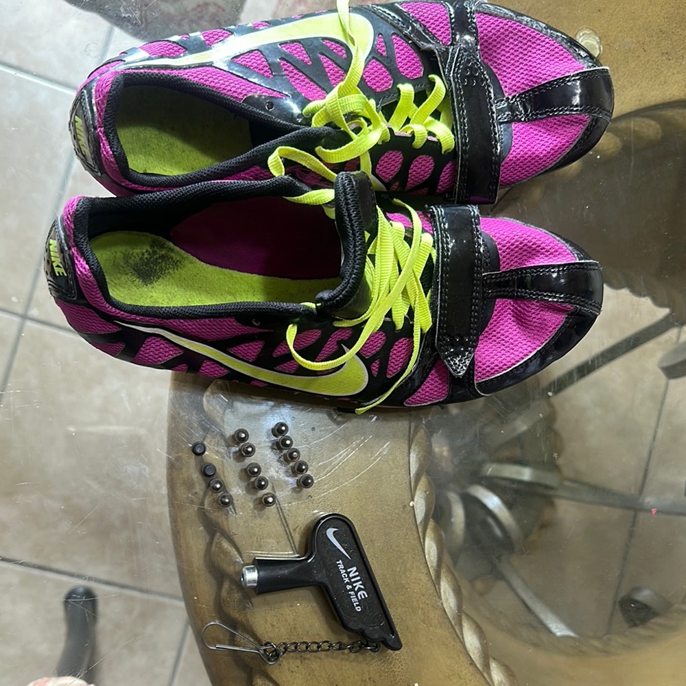 Pink and Black Athletic Shoes with Neon Accents